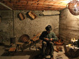 COSTRUTTORE DI CESTE/BASKET MAKER: Dario Amaranto re-enacts the ancient craft of basket maker, in Italian “cestaio” and in Kye dialect “cavanhè”. Kye is an Occitan dialect still spoken by the people living in Prea, and an element that makes the visit to the Living Crib even more interesting, especially when performers can be heard communicating with each other in such language. In one of the baskets (bottom right) the presence of some grissini (a type of breadsticks very typical of the region) can be noticed. (Gianluca Avagnina Photography)