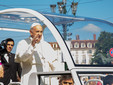 Pope Francis on the Papamobile passing by piazza Castello in Turin (Italy).